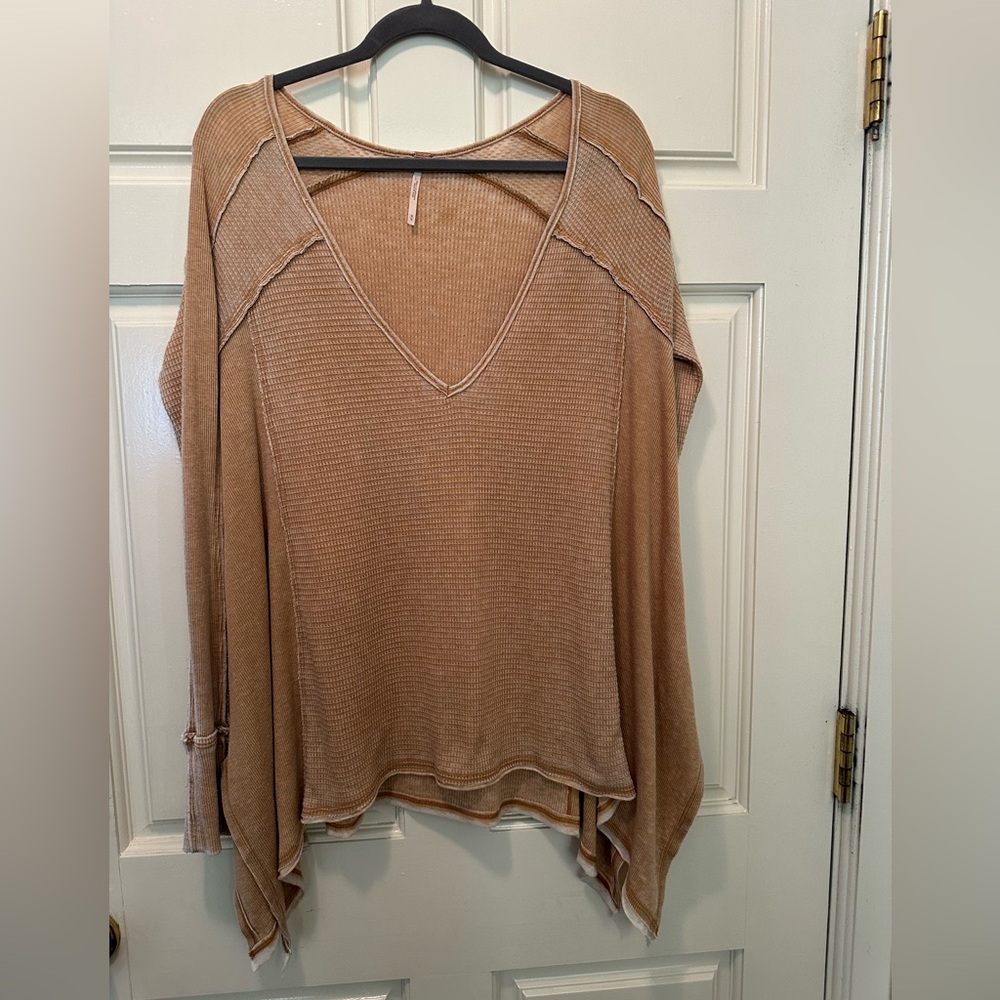 Free people top/tunic very flattering.